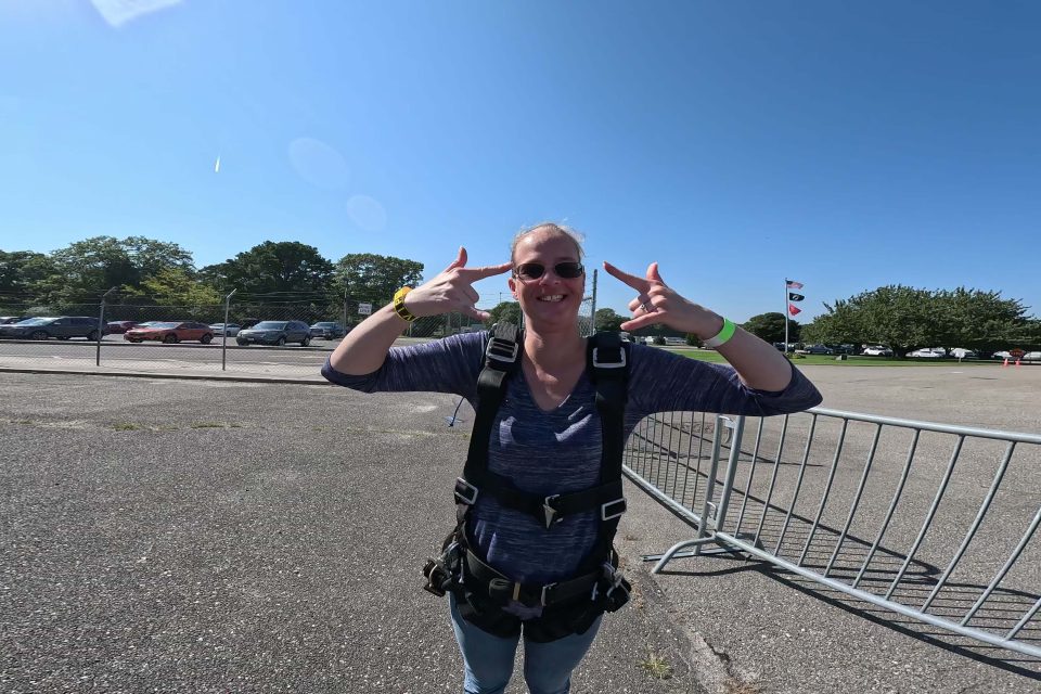 Woman skydiver getting ready to skydive